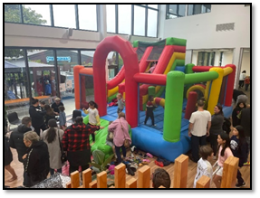 A group of people at a fair

Description automatically generated with low confidence