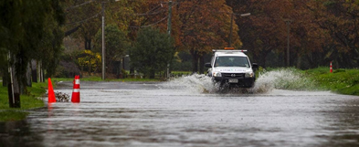 A car driving through a flooded road

Description automatically generated with medium confidence