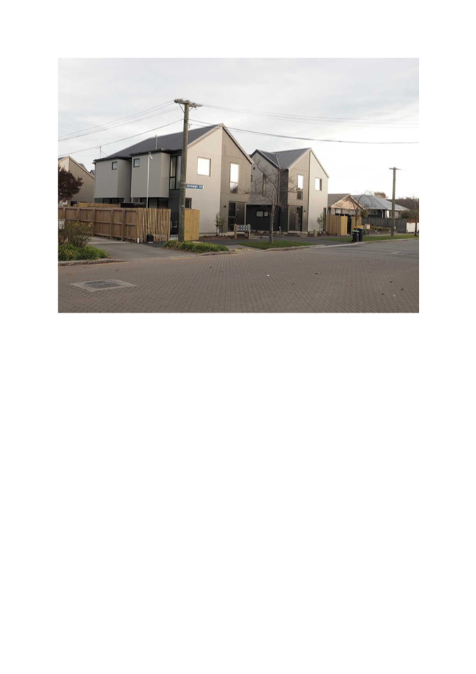 A row of houses in a neighborhood

Description automatically generated with low confidence