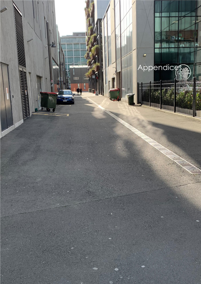A picture containing outdoor, road, building, sky

Description automatically generated