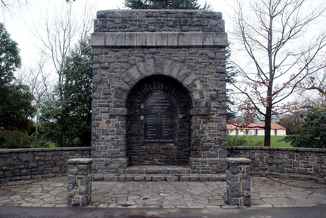 A stone monument with a plaque

Description automatically generated with low confidence