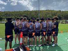 A group of people standing together

Description automatically generated with medium confidence