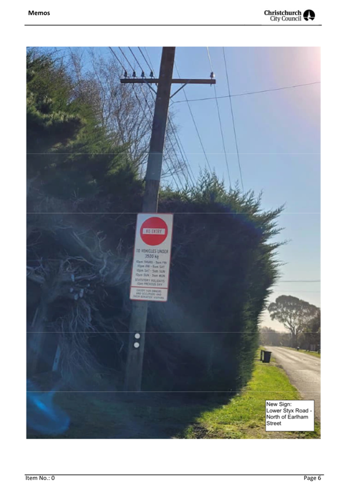 A telephone pole with a sign on it

Description automatically generated with low confidence