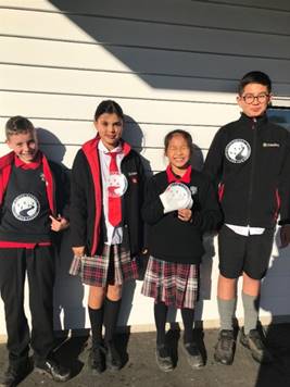 A group of people in matching outfits

Description automatically generated with low confidence