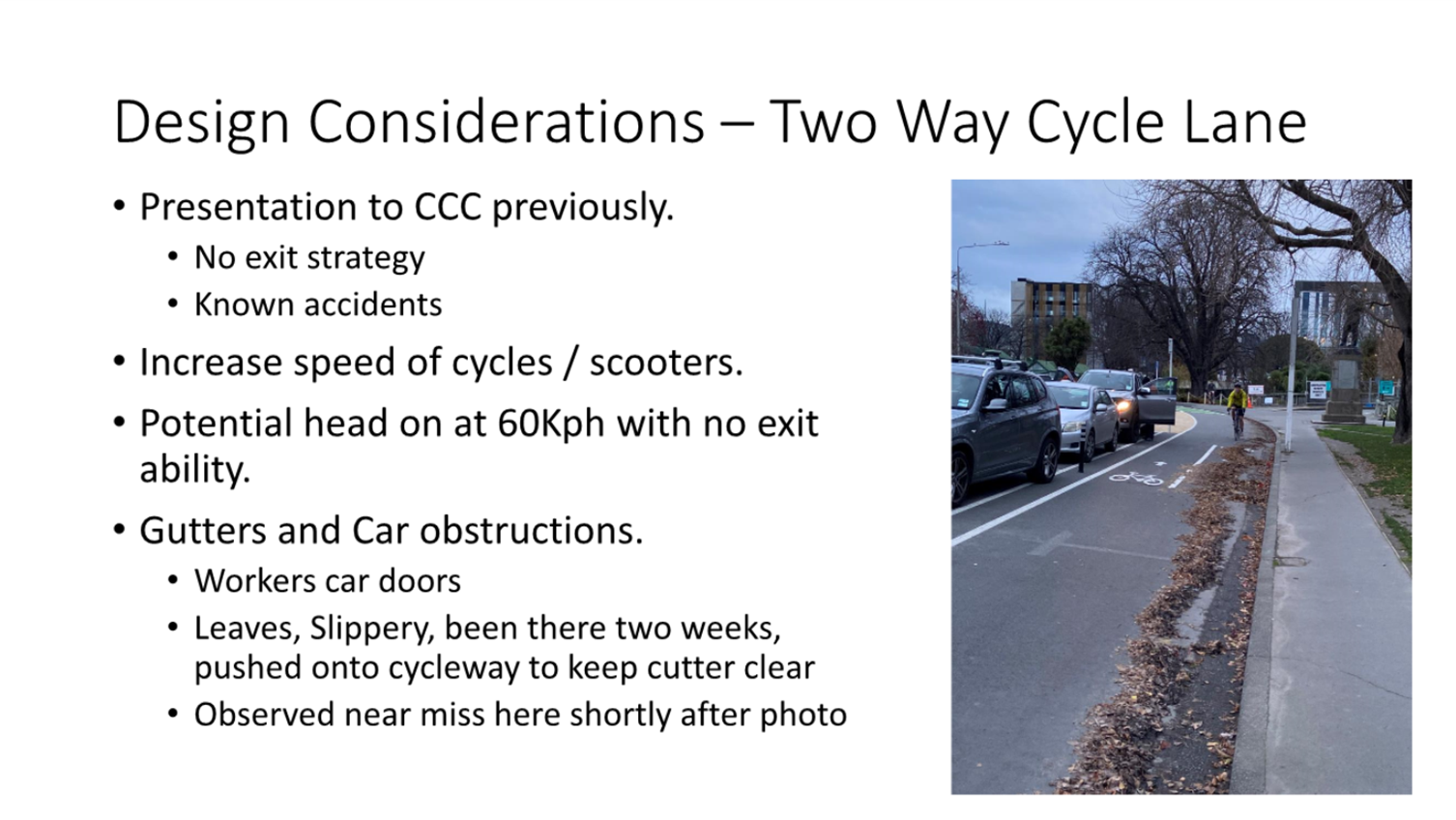 A road with cars and text

Description automatically generated