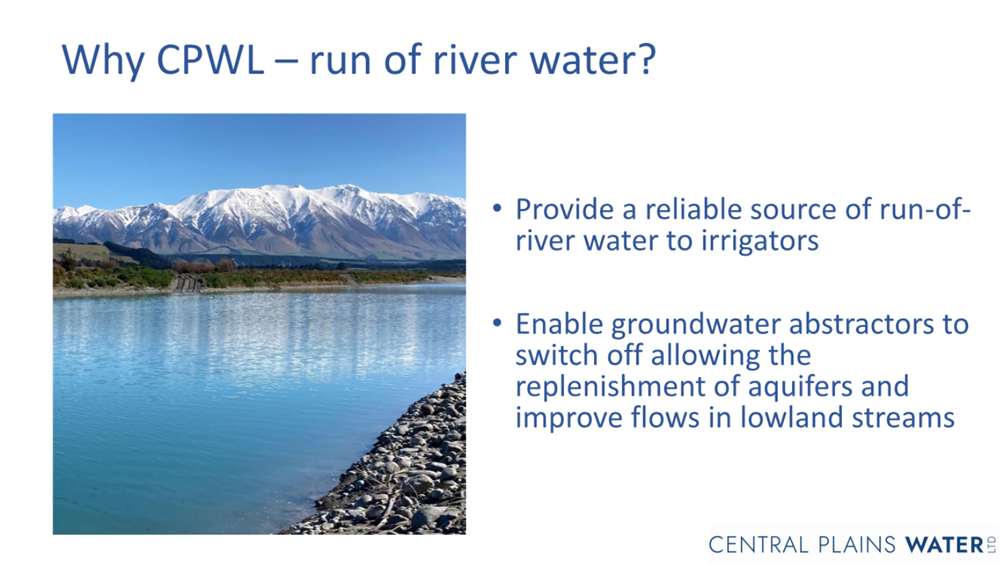 A water with mountains in the background

Description automatically generated