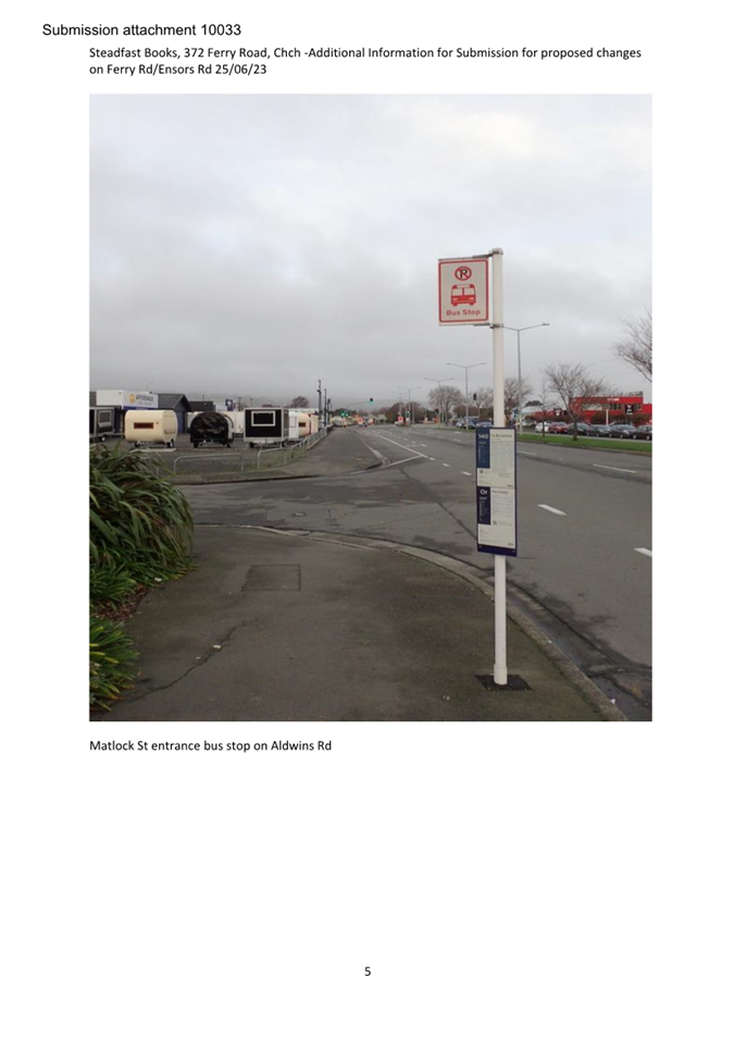 A sign on a pole

Description automatically generated