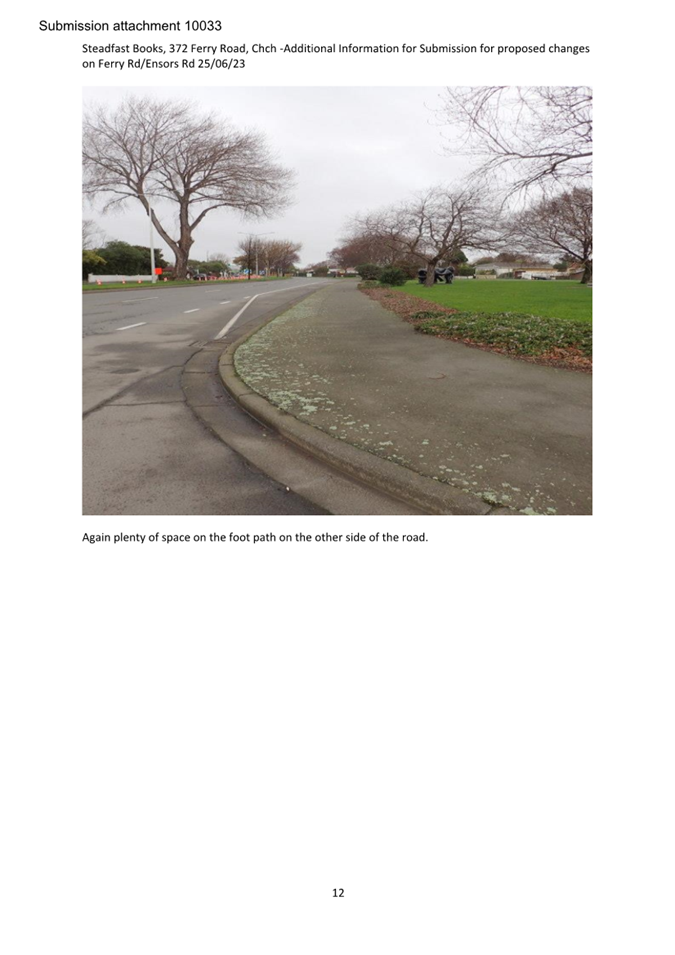 A road with trees and grass

Description automatically generated