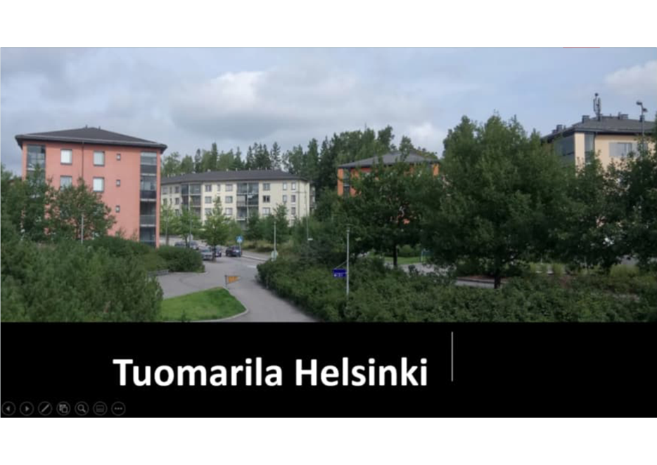 A group of buildings and trees

Description automatically generated