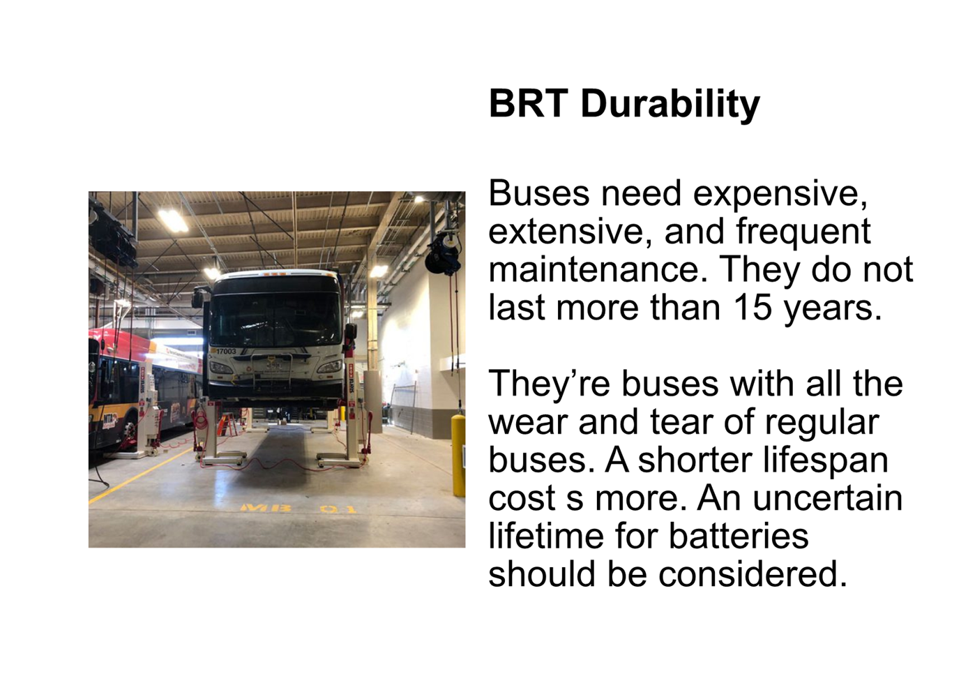 A bus in a garage

Description automatically generated