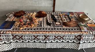 Fijian cultural items on a display table