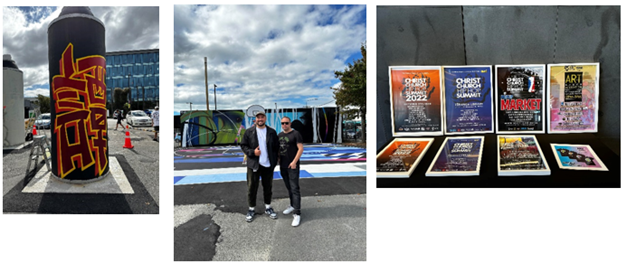 A couple of men standing in front of posters

Description automatically generated