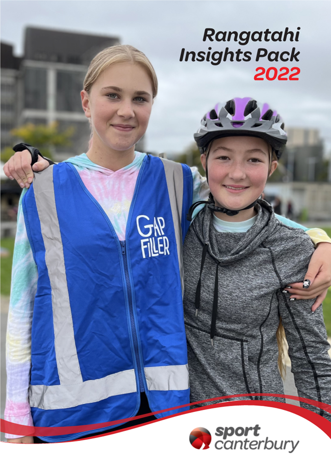Two girls posing for a picture

Description automatically generated