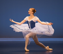 A person in a tutu dancing

Description automatically generated