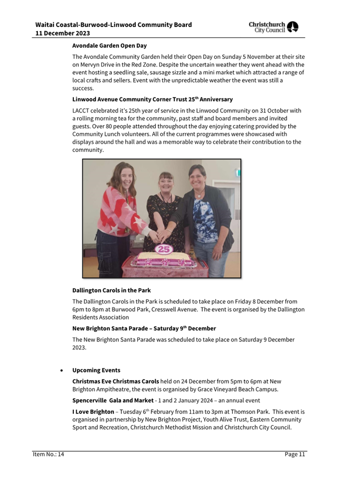 A group of people standing next to a cake

Description automatically generated