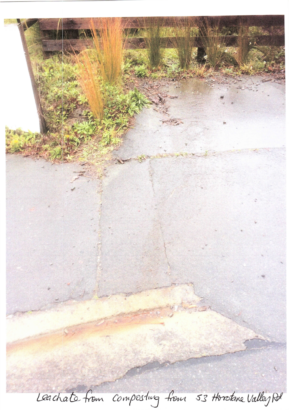 A road with a crack in the ground

Description automatically generated