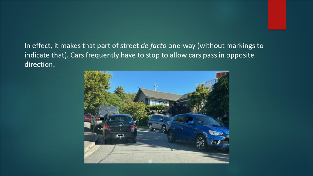 A group of cars parked on a street

Description automatically generated