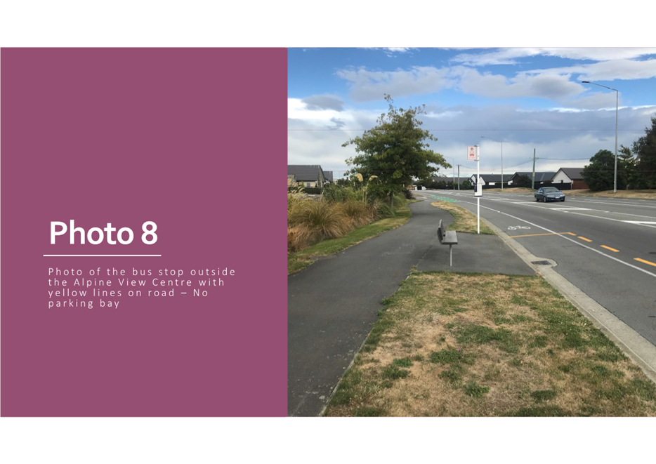 A road with a sign and a bench on it

Description automatically generated with medium confidence