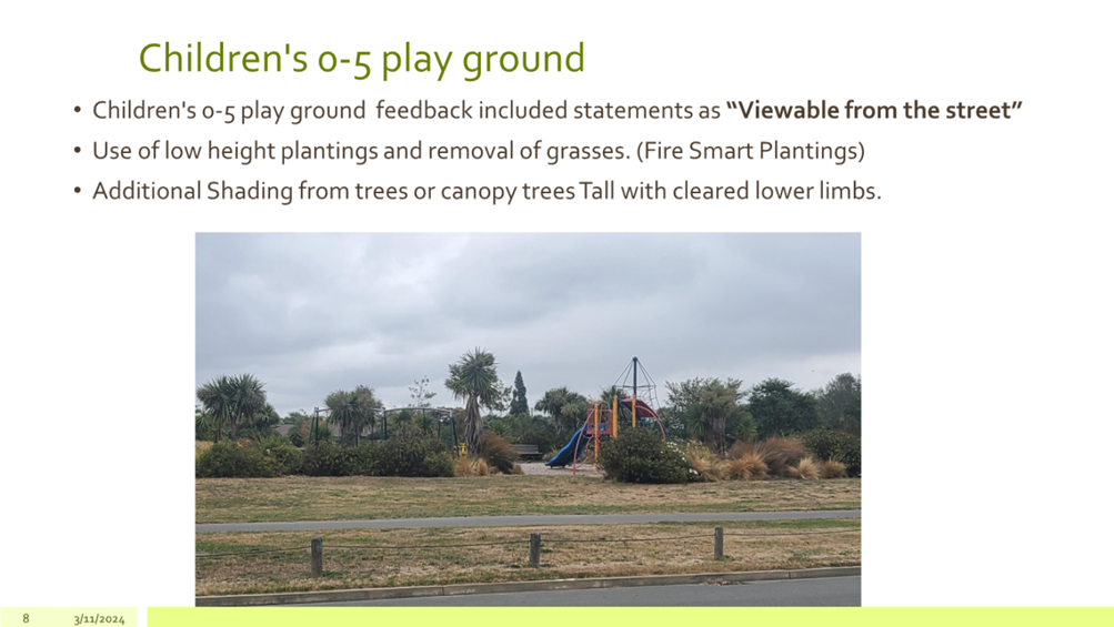 A playground with trees and a playground slide

Description automatically generated