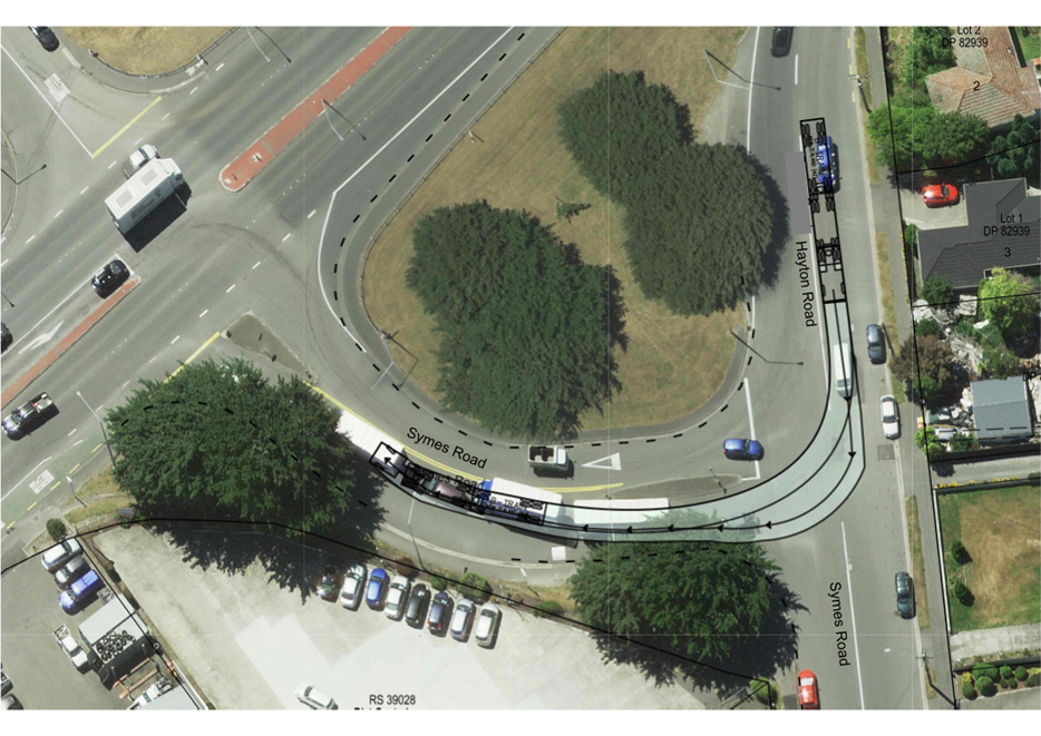 Aerial view of a roundabout

Description automatically generated