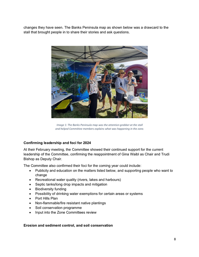 A group of people standing in front of a tent

Description automatically generated