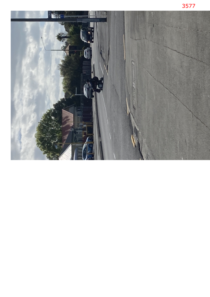 A motorcycle on the road

Description automatically generated