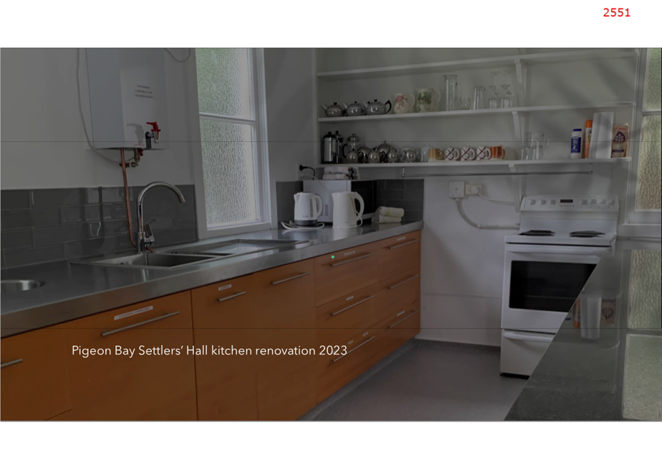 A kitchen with a sink and a stove

Description automatically generated