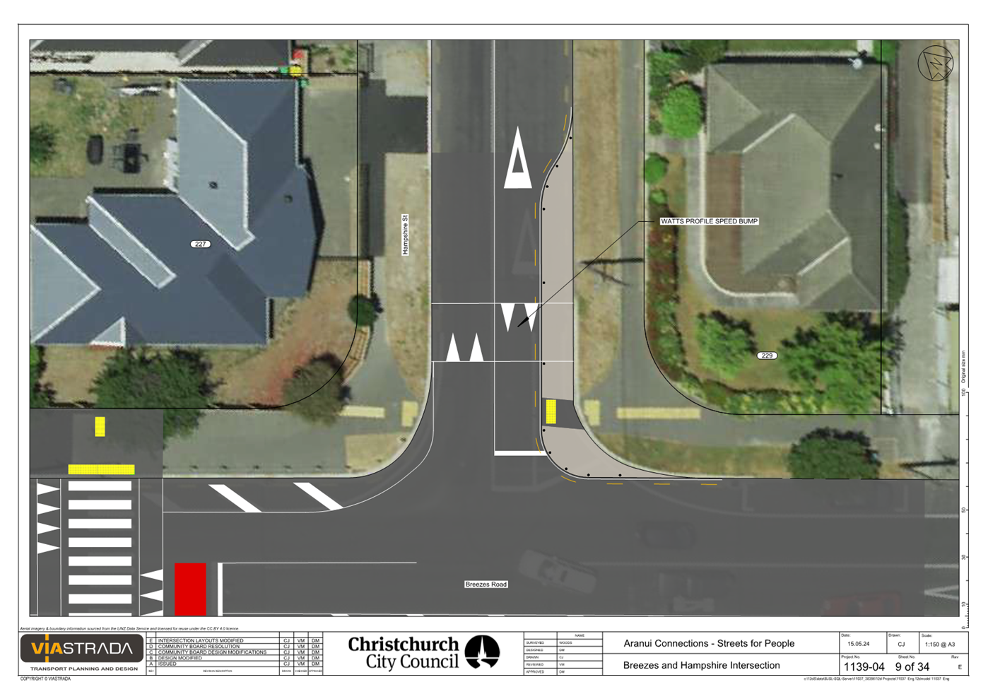 A crosswalk with a road and buildings

Description automatically generated with medium confidence