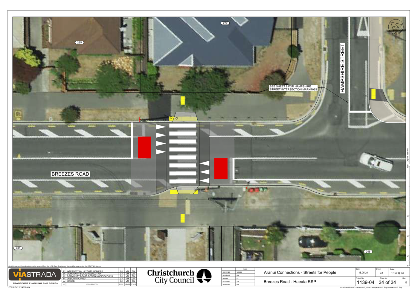 An aerial view of a crosswalk

Description automatically generated