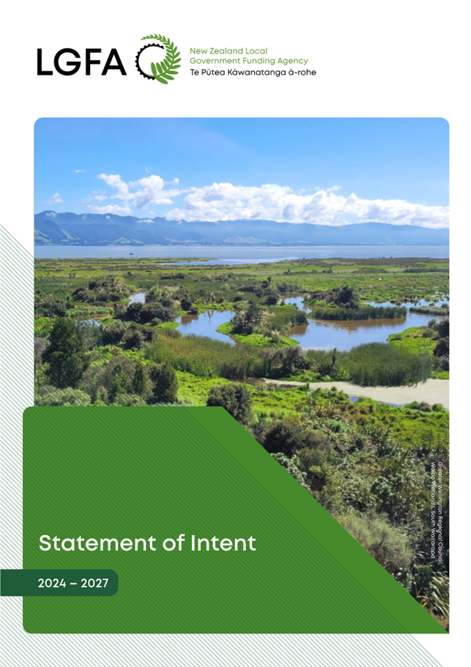 A landscape with water and mountains in the background

Description automatically generated