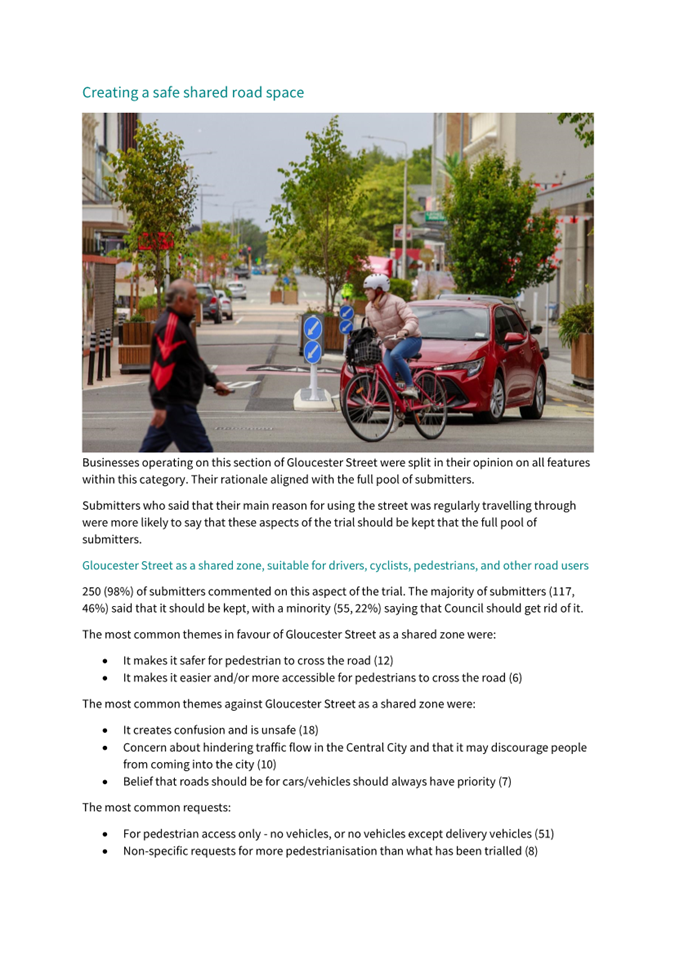 A person walking past a red car

Description automatically generated