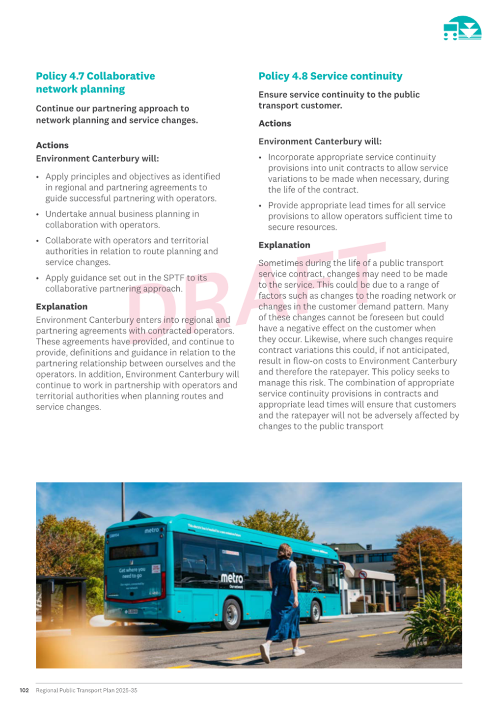 A person standing next to a bus

Description automatically generated