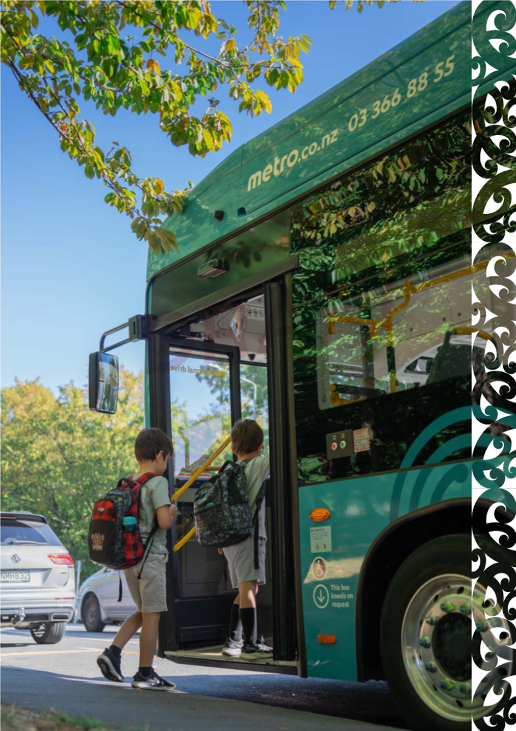 Two children getting off a bus

Description automatically generated
