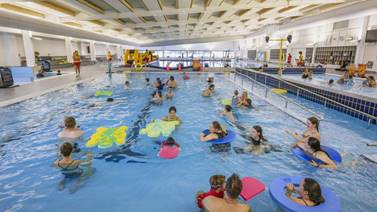 A group of people swimming at Matatiki Hornby Centre Pool.
