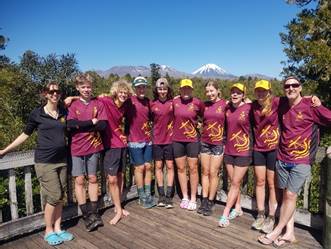 A group of people posing for a picture

Description automatically generated