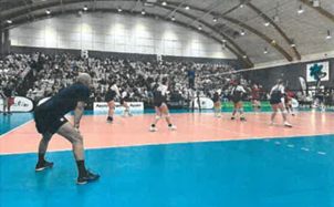 A group of people playing volleyball

Description automatically generated