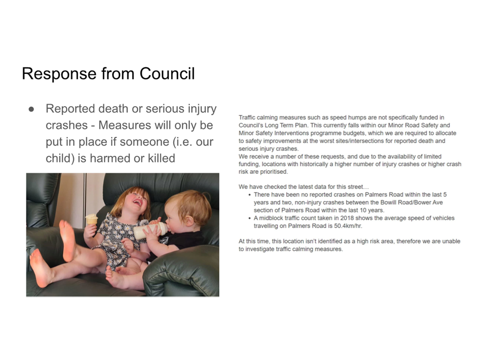 A child sitting on a couch with a baby bottle

Description automatically generated