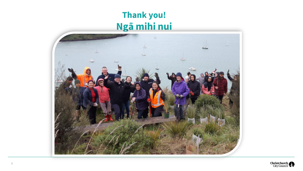 A group of people posing for a photo

Description automatically generated
