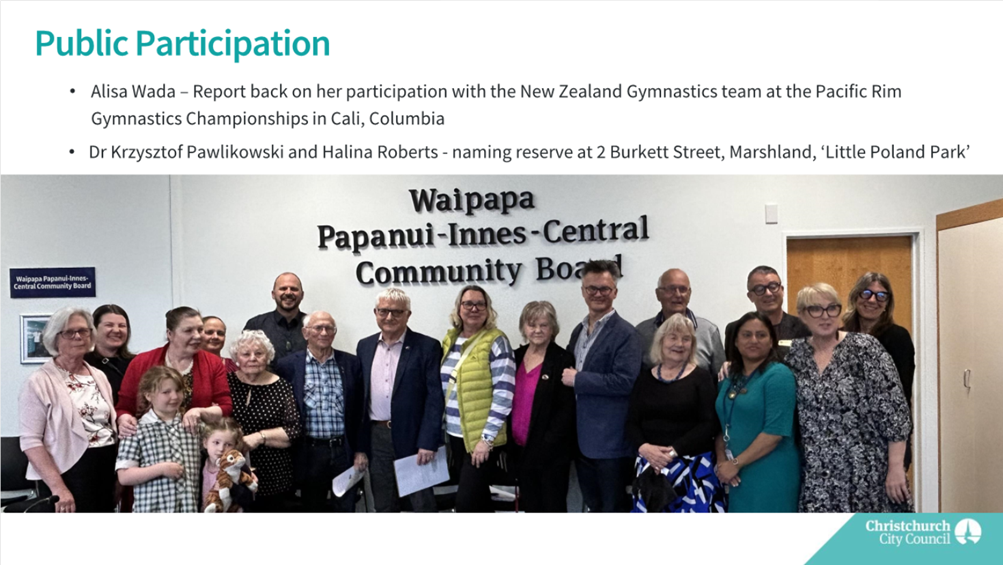 A group of people posing for a photo

Description automatically generated