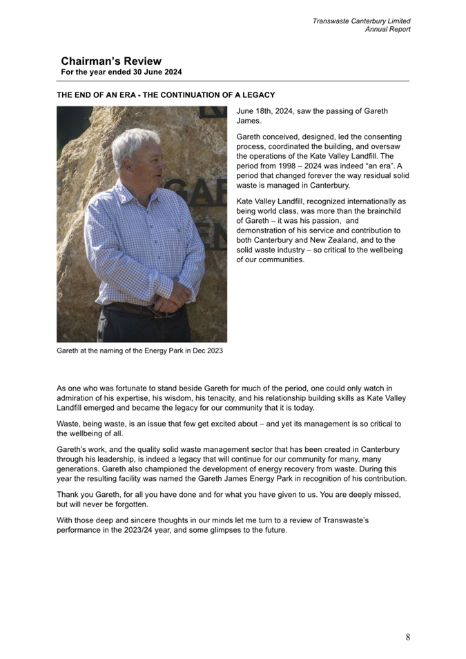 A person standing next to a rock

Description automatically generated