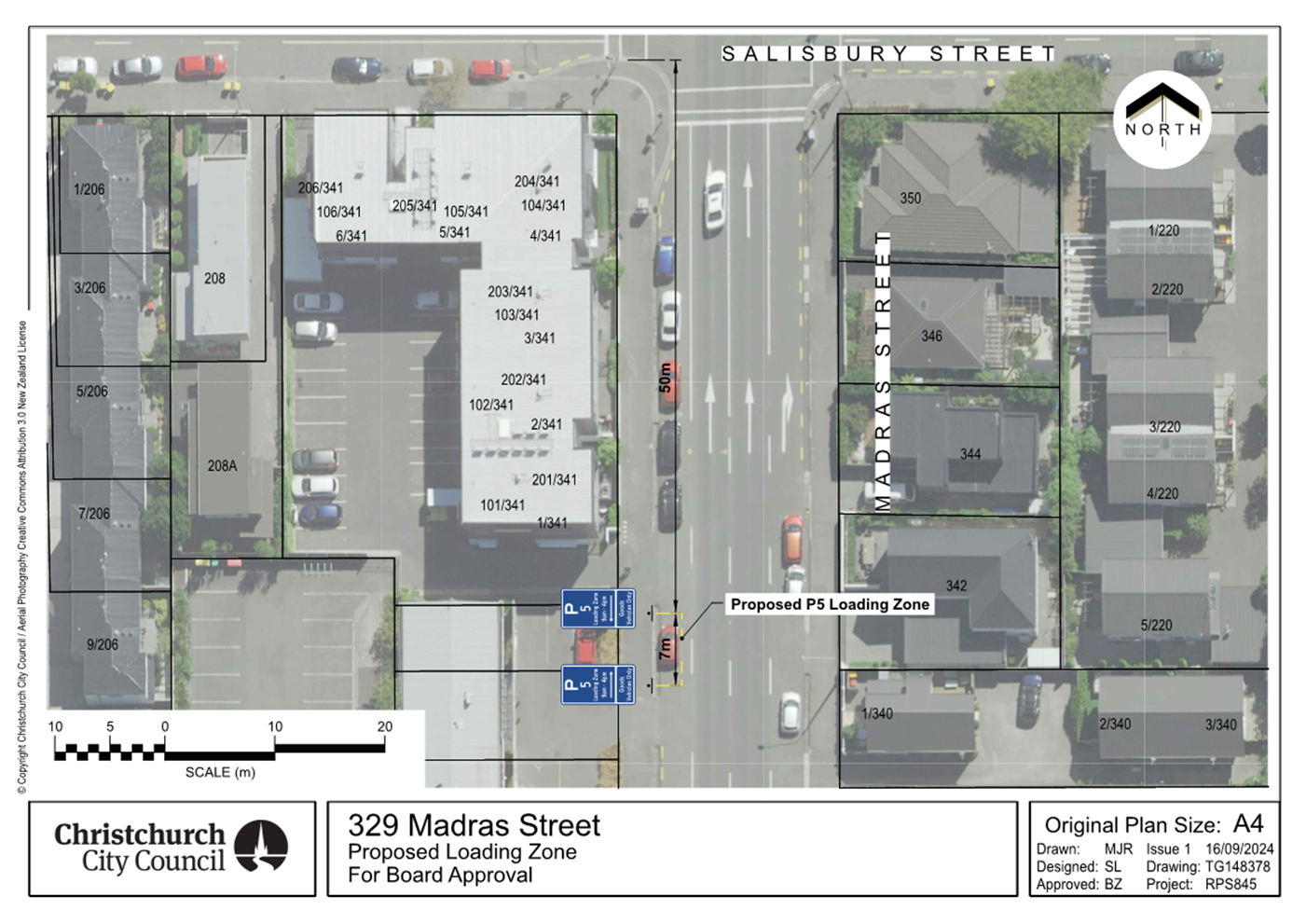 Aerial view of a street with cars and buildings

Description automatically generated