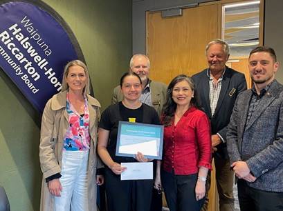 A group of 5 board members with Eleanor Dunn posing for a photo