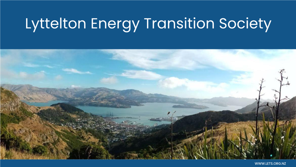 A landscape with a body of water and a city

Description automatically generated