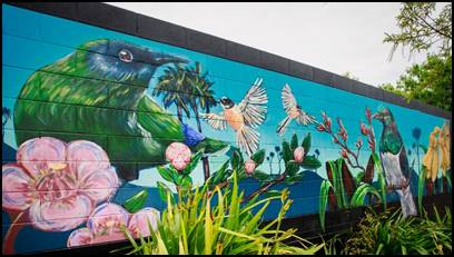 A mural of birds and flowers

Description automatically generated