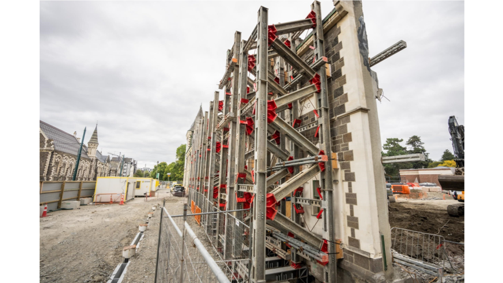 A building under construction with scaffolding

AI-generated content may be incorrect.