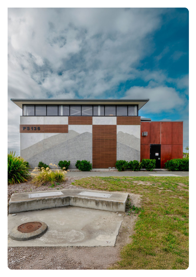 A building with a concrete bench

AI-generated content may be incorrect.