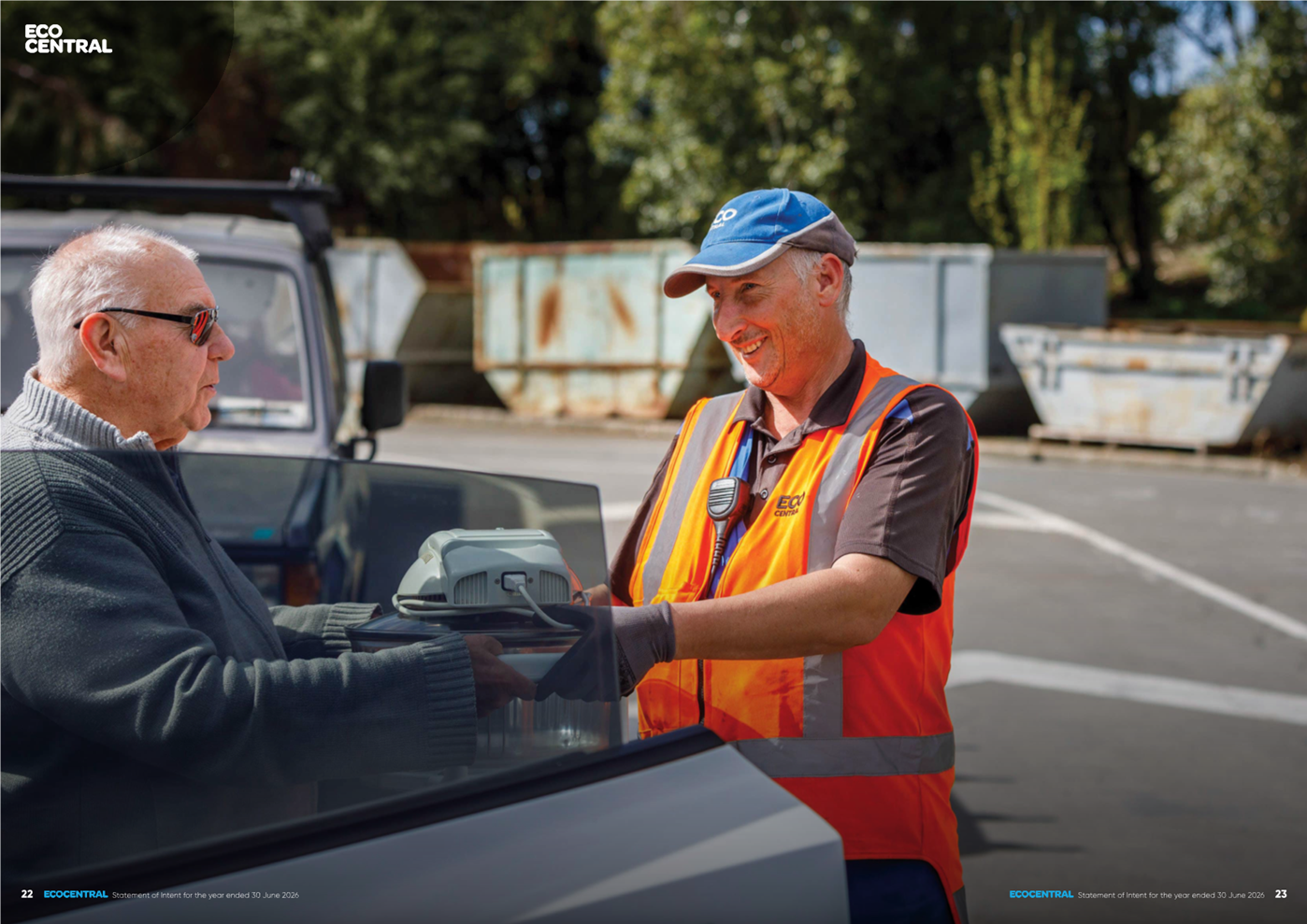 A person in an orange vest handing a machine to a person in a car

AI-generated content may be incorrect.