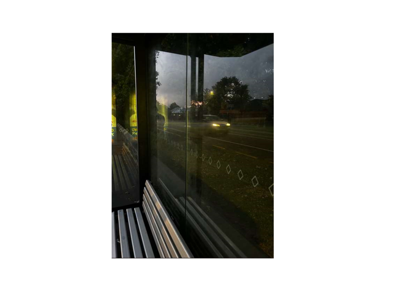 A bus stop with a view of the road

AI-generated content may be incorrect.