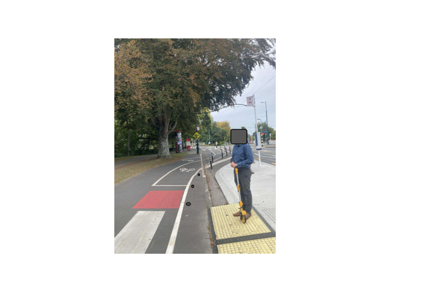 A person standing on a sidewalk with a tv screen

AI-generated content may be incorrect.