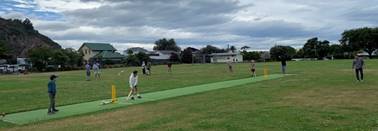A group of people on a grass field

AI-generated content may be incorrect.